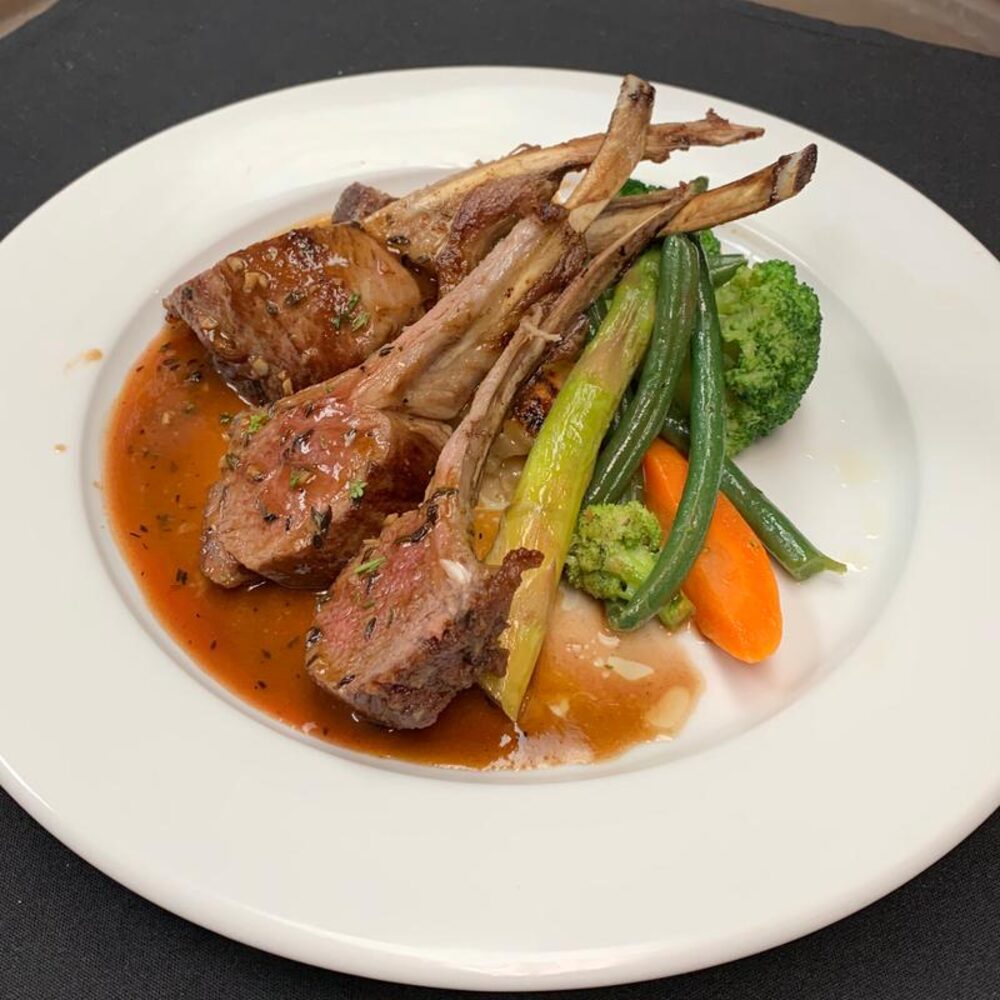 Rack of lamb chops plated at Frederick's Bistro